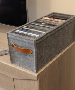 Aufbewahrungskorb für CDs mit Ledergriff